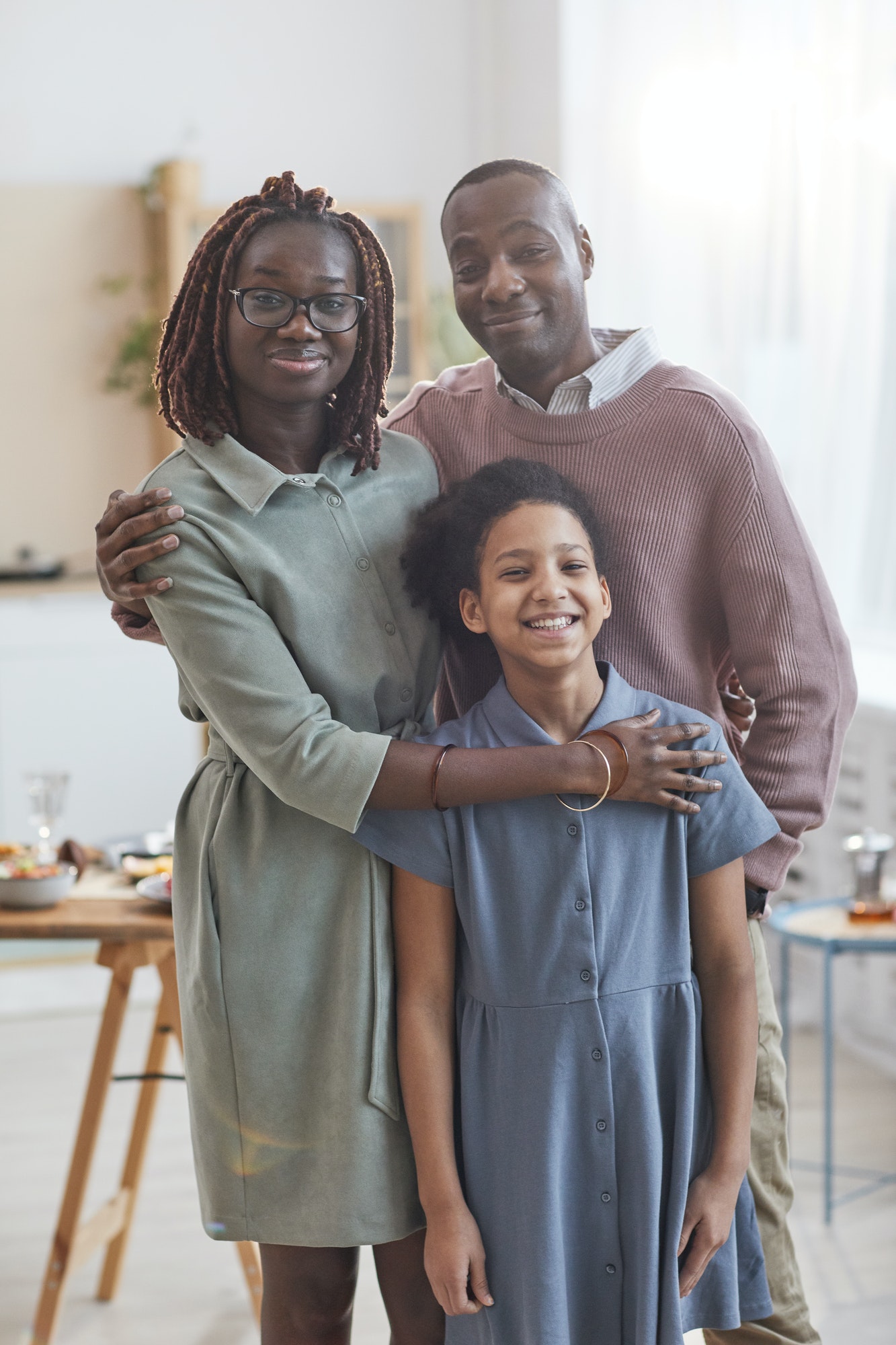 Modern African American Family Posing in Home Interior