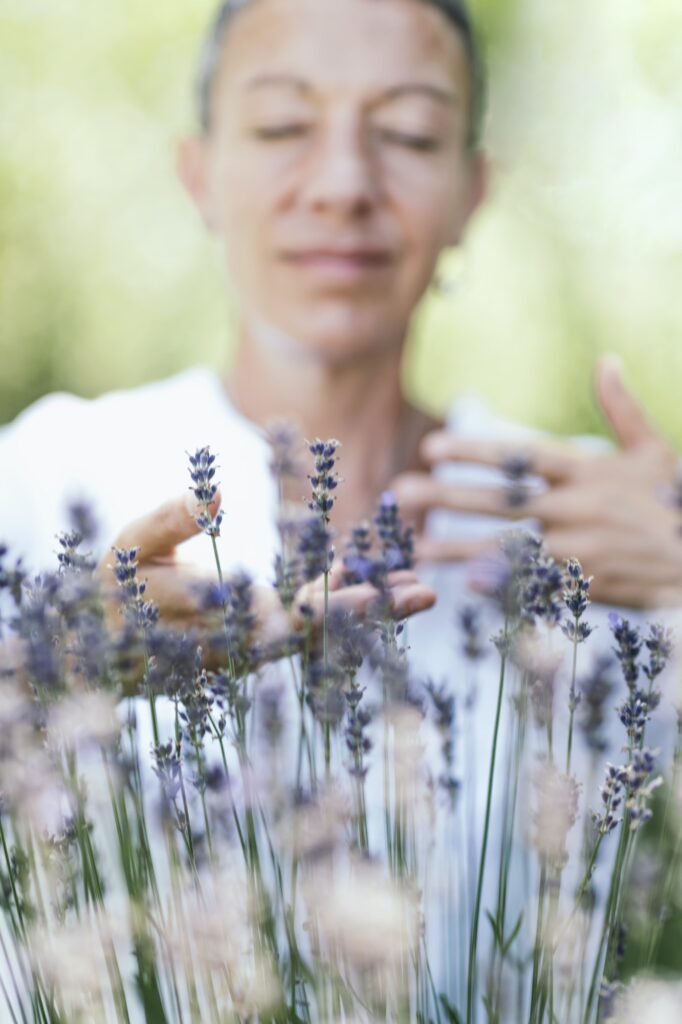 Self-Care Practice in Nature. Breathing Exercise in the Lavender Field.